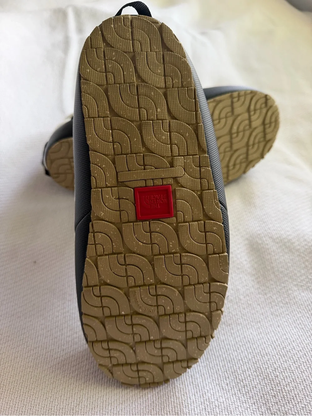 The North Face White and Black Quilted Slip-On Winter Booties
